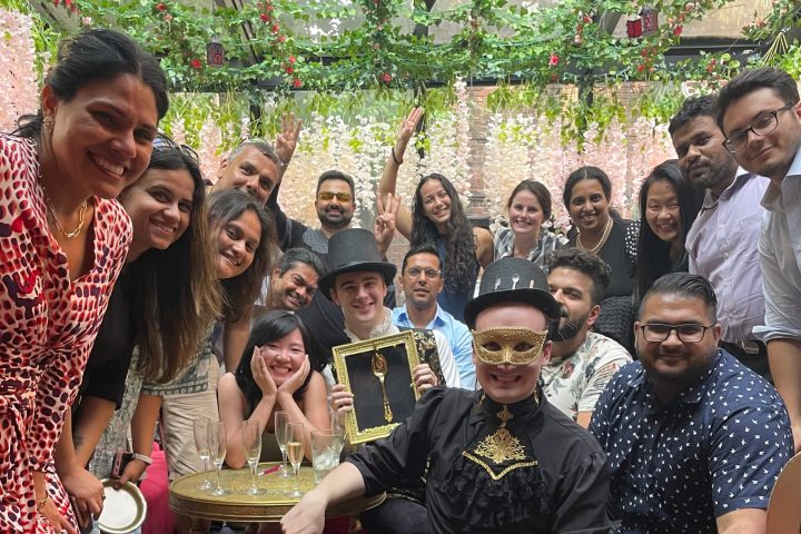 a group of people posing for a photo